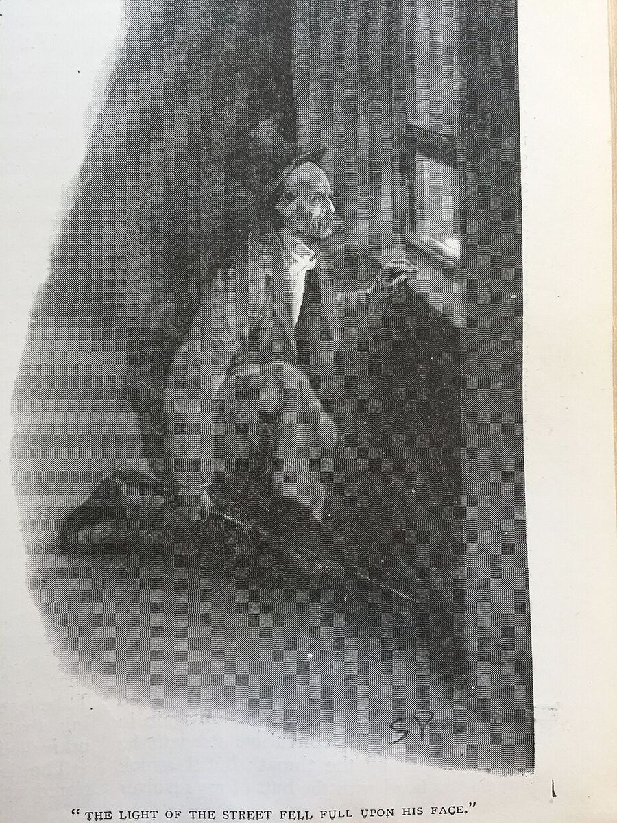 The light of the street fell full upon his face.